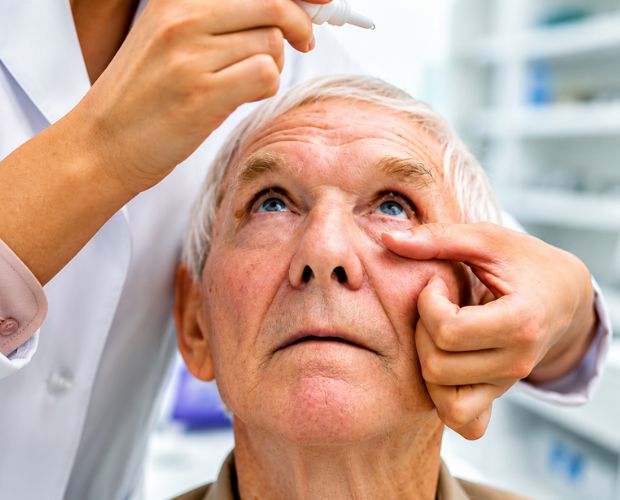 Senior patient undergoing a retinal eye examination at The SEE Clinic